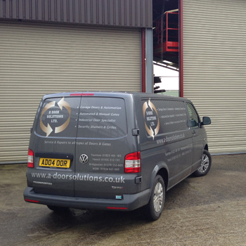 A-Door Solutions van outside an industrial unit